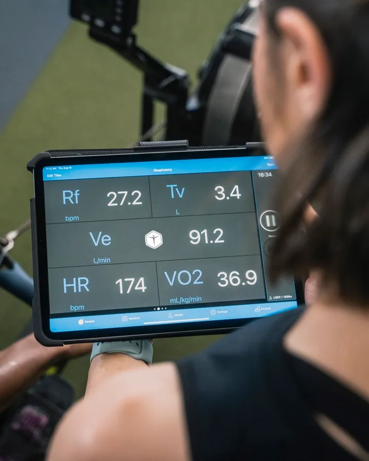 Checking the day on a tablet in the gym